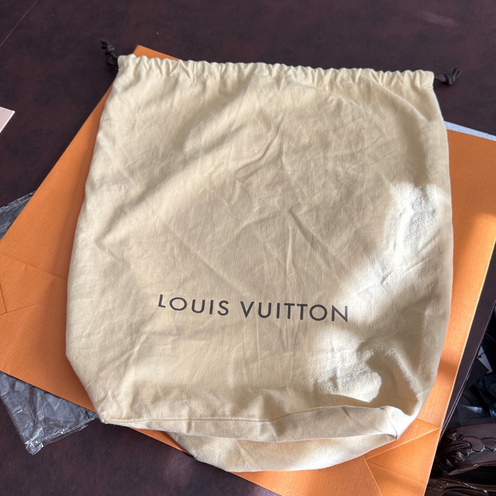Authentic Louis Vuitton dust bag drawstring pouch.